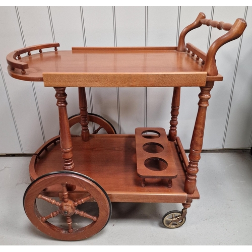 A vintage drinks/tea cart. Would make an ideal gin trolley!. Dimensions(cm) H80, W75, D53.