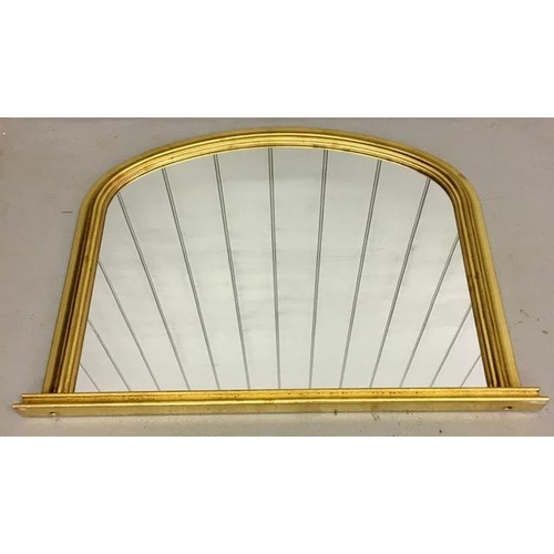 87 - A large contemporary, gilded, arched overmantle mirror. Dimensions 72cm x 98cm.