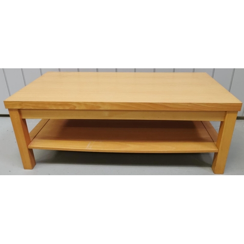 104 - A contemporary, beech veneered coffee table with single underside shelf. Dimensions(cm) H45, W120, D... 