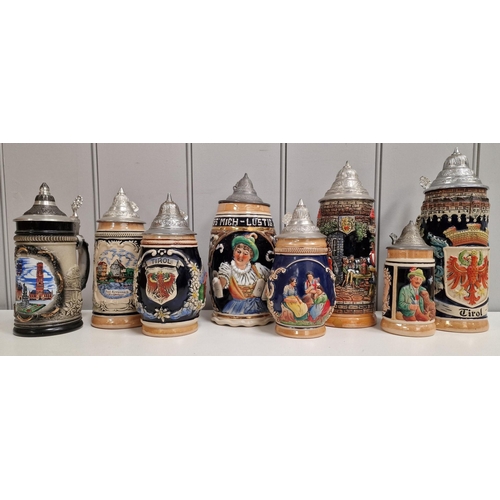 159 - A collection of eight vintage, lidded beer steins. Tallest 24cm.