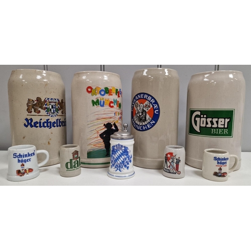 170 - A collection of nine vintage, German ceramic beer tankards. Tallest 20cm.