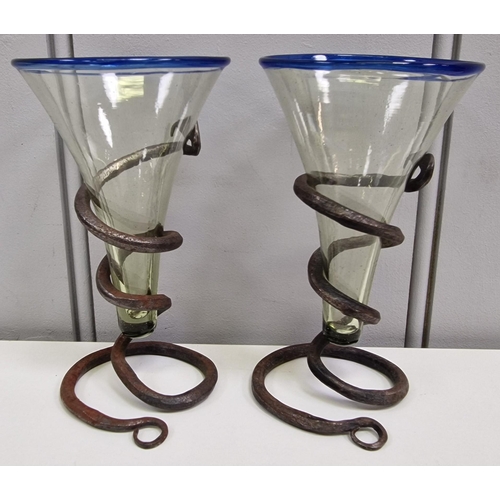 176 - A pair of blue-rimmed 'Viking Cone' mead glasses, each with an iron serpent stand.  Height 12cm, dia... 