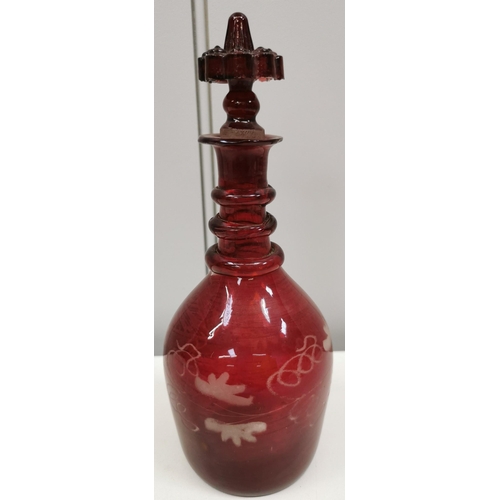 197 - A vintage Bohemian glass, ruby red perfume decanter. Height 23cm.