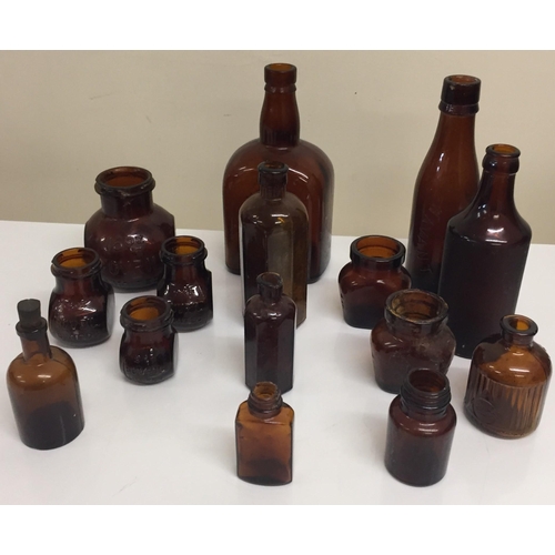 206 - A collection of fifteen brown glass bottles. Makers include GWR, Bovril, (2,4,4 16oz), OXO (4oz x2),... 