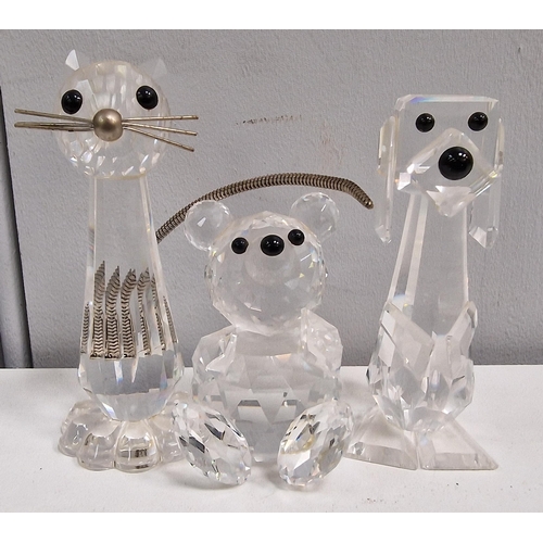 223 - Three pieces of boxed 'Swarovski' crystal art. To include cat, dog & teddy bear. Tallest 7.5cm.