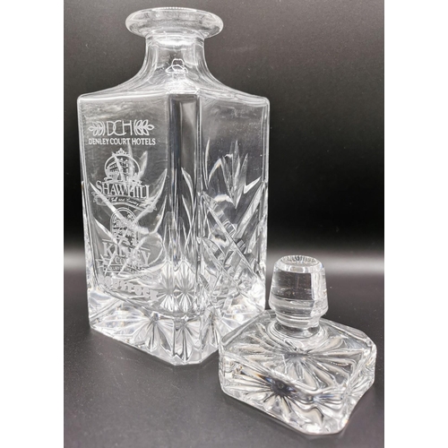 237 - A cut-glass decanter, with tumbler. Decanter engraved 'DCH - Denley Court Hotels, Shawhill'.