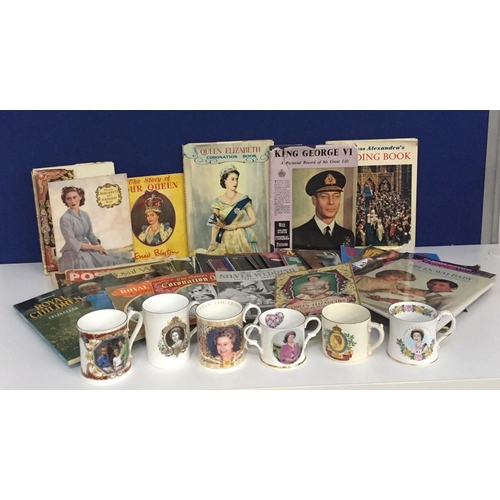 233 - A collection of Royal memorabilia mugs & books. Includes Queen Elizabeth's coronation, gold & silver... 