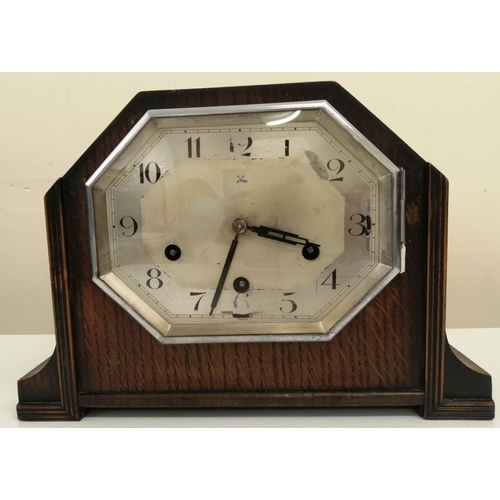 382 - A large, art-deco, oak-cased mantle clock. Adjustable levers for chime/silent and West/Whit. Appears... 