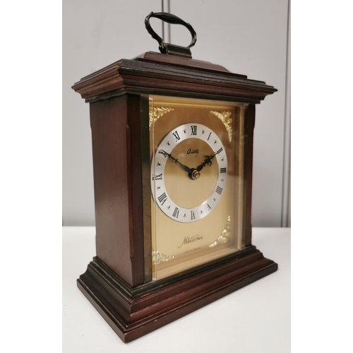 385 - A dark wood carriage clock, by 'Metamec' (height 21cm), together with a wall barometer, by 'Weatherm... 