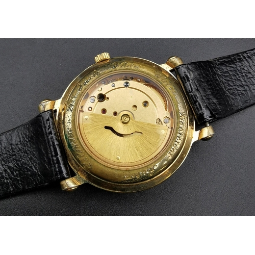 392 - A vintage gentleman's automatic watch, by 'Limit'. 21 jewels, with black leather strap. Tested & app... 