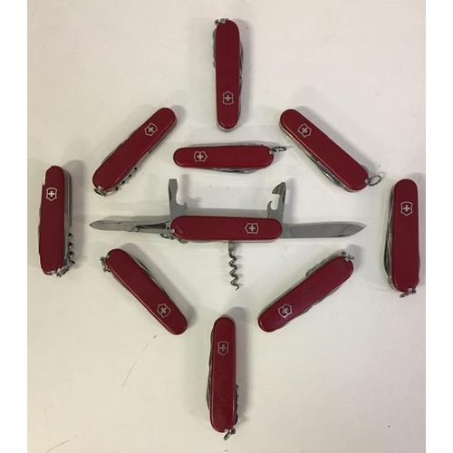 A collection of ten Swiss Army Knives (multitools). Appear unused.