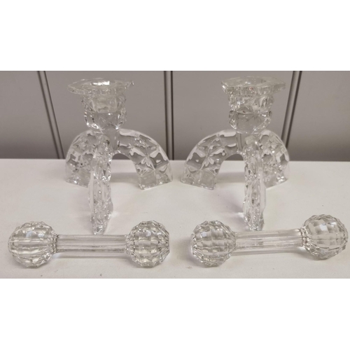 1088A - A pair of vintage tri-legged crystal candleholders, together with a pair of crystal knife rests.