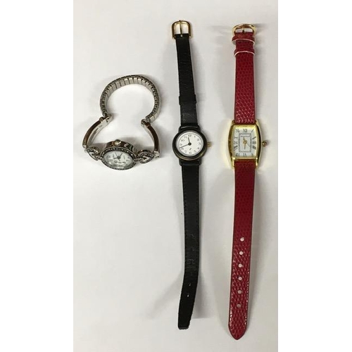 1202 - Three ladies watches, by Gabriella Vicenza (gold coloured, red strap), Le Chat (stainless steel brac... 