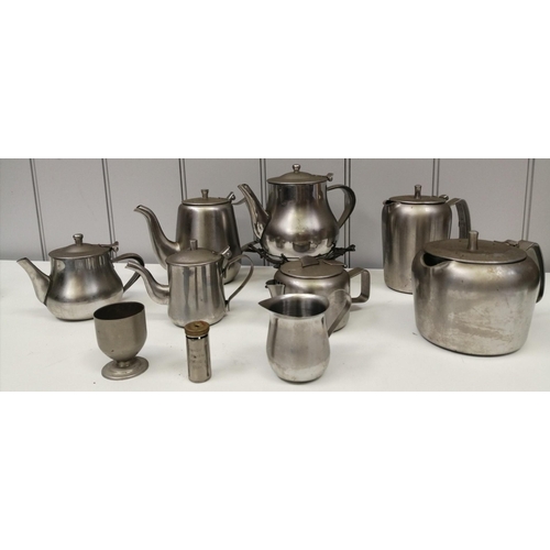 1254 - A selection of eleven pieces of vintage, stainless steel tableware.