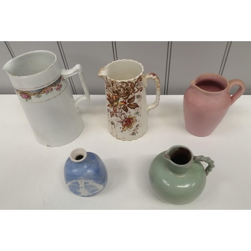 1301 - A collection of four ceramic jugs & a bud vase. Makers include 'Dee Cee', 'Crown Pottery', 'Durham' ... 