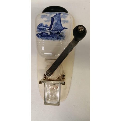 1376 - A vintage, Delft wall-mounted coffee-grinder. Length 30cm.