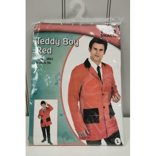 1531 - A selection of five packaged, adult fancy-dress outfits. To include Teddy Boy Red; Flared Trousers; ... 