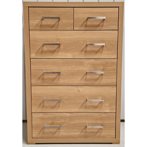 29 - A contemporary, oak two over four bedroom chest of drawers. Dimensions(cm) H113, W76, D40.