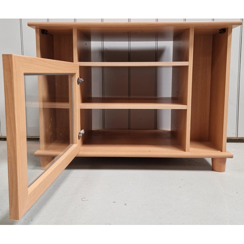 34 - A contemporary, beech-coloured TV cabinet. Dimensions(cm) H60, W80, D42.