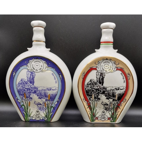 1103 - A trio of Hungarian ceramic liqueur flasks 'Beregi'. Height 20cm.