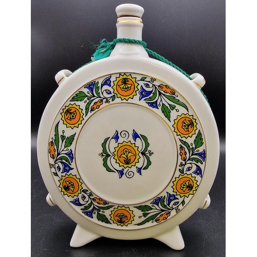 1105 - A pair of Hungarian ceramic liqueur flasks 'Hollohaza'. Heights 20cm/22cm.