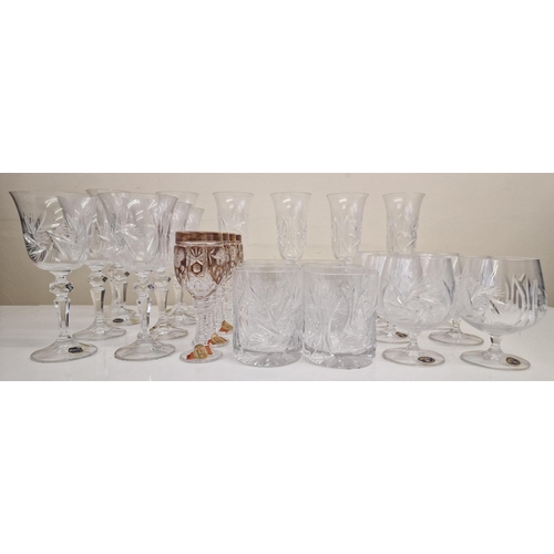 241 - A set of twenty-four 'Bohemia Crystal' glasses, together with another set of four decorate dlead cry... 