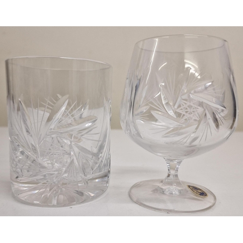 241 - A set of twenty-four 'Bohemia Crystal' glasses, together with another set of four decorate dlead cry... 