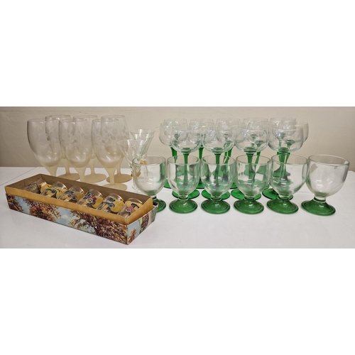 245 - A collection of vintage coloured glassware. To include thirty-five items in total.