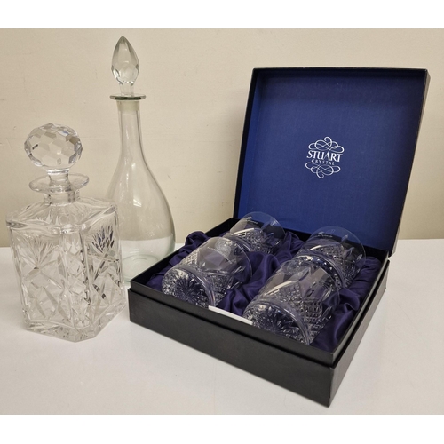 254 - A boxed set of four 'Stuart Crystal' tumblers, together with two decanters.