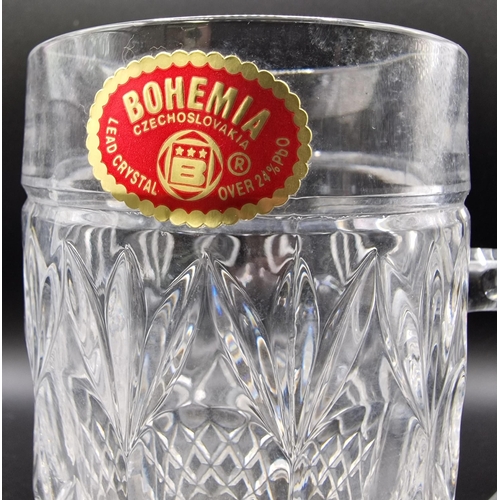 256 - A pair of Bohemia lead crystal mugs.