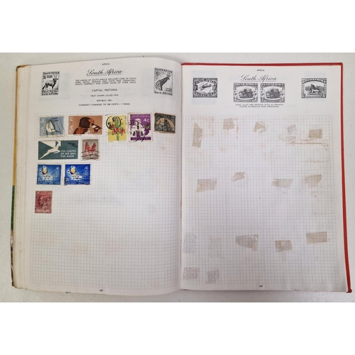 134 - A collection of four partially-filled stamp albums, containing a variety of worldwide stamps.