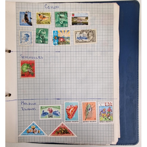 134 - A collection of four partially-filled stamp albums, containing a variety of worldwide stamps.