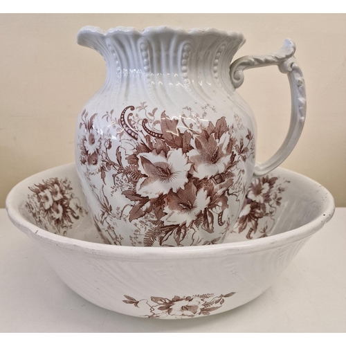 412 - A vintage two-piece wash set. Stamped 'Defender England'. Jug height 26cm.