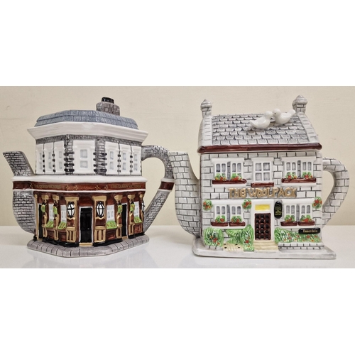 415 - A pair of TV show themed, novelty teapots. To include 'Eastenders - Queen Vic' & 'Emmerdale - The Wo... 