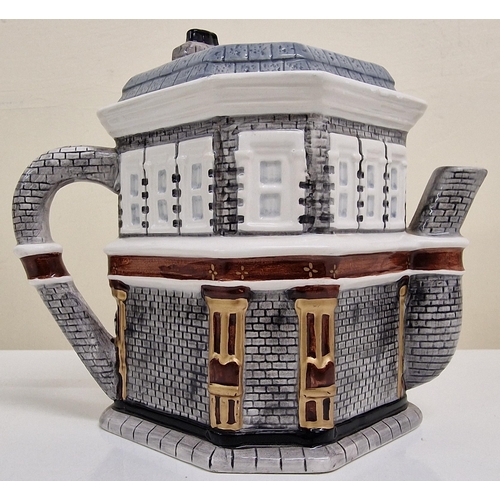 415 - A pair of TV show themed, novelty teapots. To include 'Eastenders - Queen Vic' & 'Emmerdale - The Wo... 