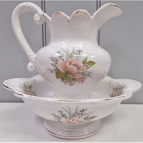 419 - A vintage, two-piece wash set. Floral decoration, with gilded detail. Dimensions(cm) Bowl H10, W29, ... 