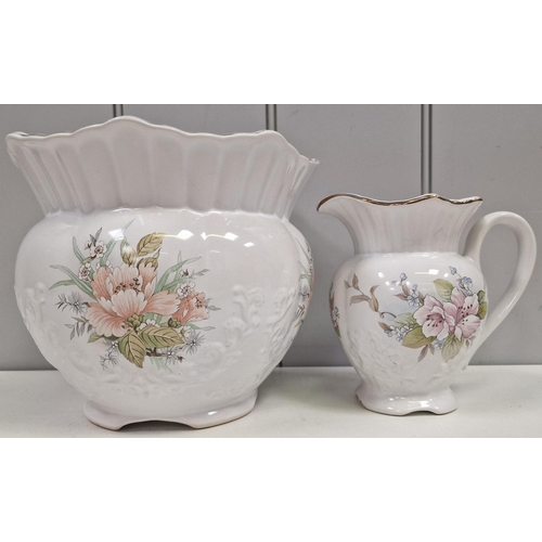 460 - A 'Maryleigh Pottery' floral-patterned planter, together with a similar-patterned jug. Respective di... 