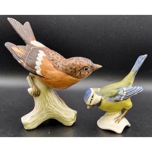 470 - Two vintage 'Goebel' bird figures. To include Brambling & Blue Titmouse. Heights 13cm/9cm.