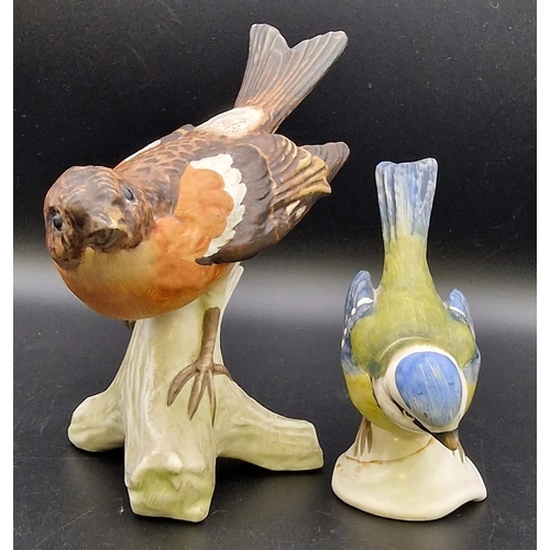 470 - Two vintage 'Goebel' bird figures. To include Brambling & Blue Titmouse. Heights 13cm/9cm.