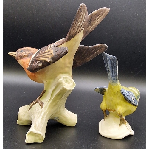 470 - Two vintage 'Goebel' bird figures. To include Brambling & Blue Titmouse. Heights 13cm/9cm.