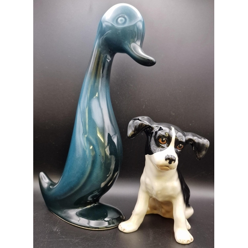 471 - A vintage Blue Mountain duck figure, together with a Sylvac Spaniel puppy. Respective heights 26cm/1... 