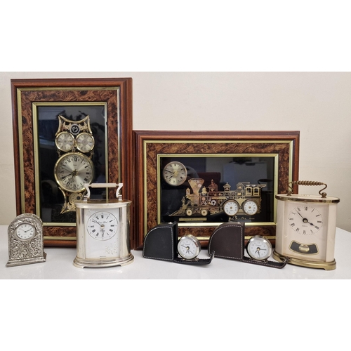 387 - A collection of wall, mantle & travel clocks. To include two Ken Broadbent examples (train & owl), c... 