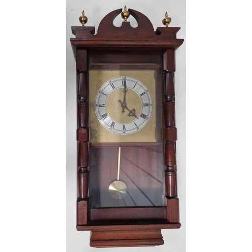 396 - A battery-powered, pendulum wall clock. Untested. Dimensions(cm) H64, W28, D12.