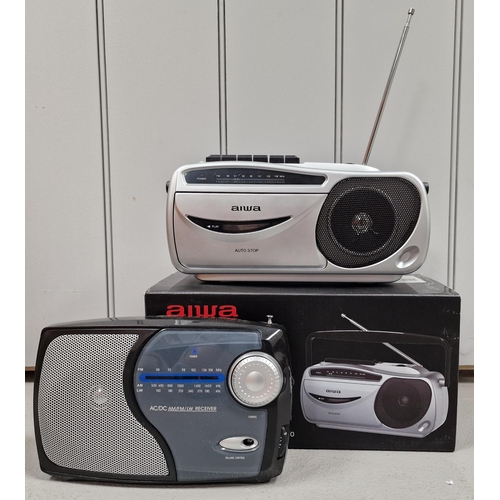 1552 - A boxed 'Aiwa' radio-cassette player, model no.11182; a 'Tesco' radio, model no.RAD113B & a collecti... 