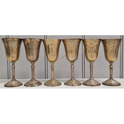 453 - A set of six brass goblets, together with a plated serving tray.