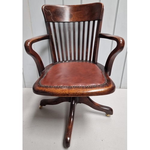 A stunning, Edwardian mahogany, swivel desk chair, with leather upholstered seat. Dimensions(cm) H83 (47 to seat), W56, D55.