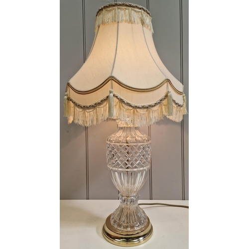 63 - A vintage cut-glass table lamp, with pleated cream shade. PAT test pass & functionality test indicat... 