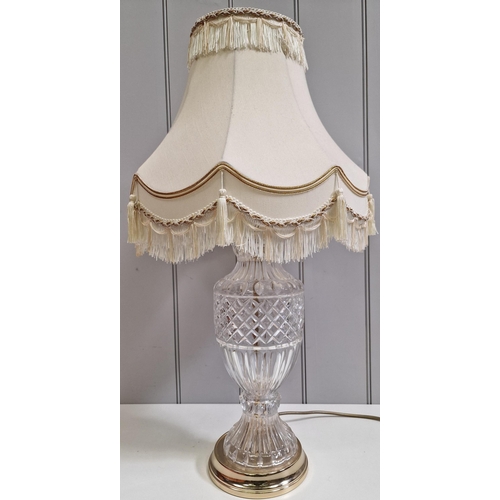 63 - A vintage cut-glass table lamp, with pleated cream shade. PAT test pass & functionality test indicat... 