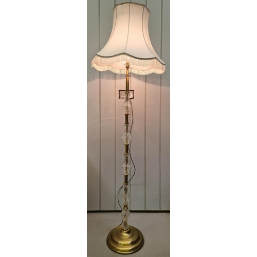 65 - A vintage brass floor lamp, with cut glass adornments to stem. Complete with two shades. PAT test pa... 