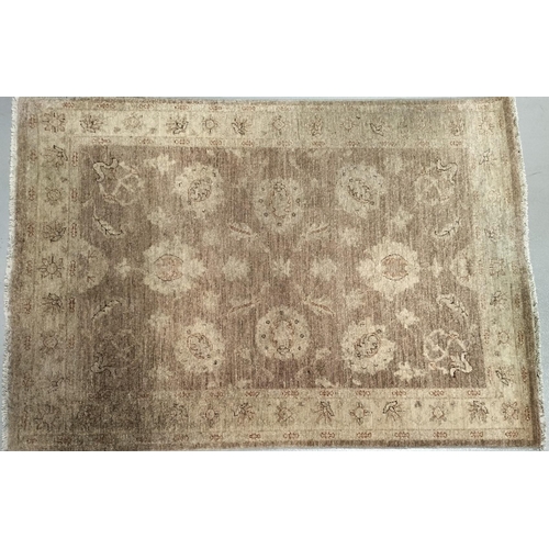 83 - A handmade Afghan Ziegler wool rug. Length approx. 180cm, width approx. 123cm. Supplied with copy of... 